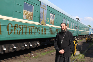 Illustration for article titled These Train Cars Converted Into Churches Are Literal Holy Rollers